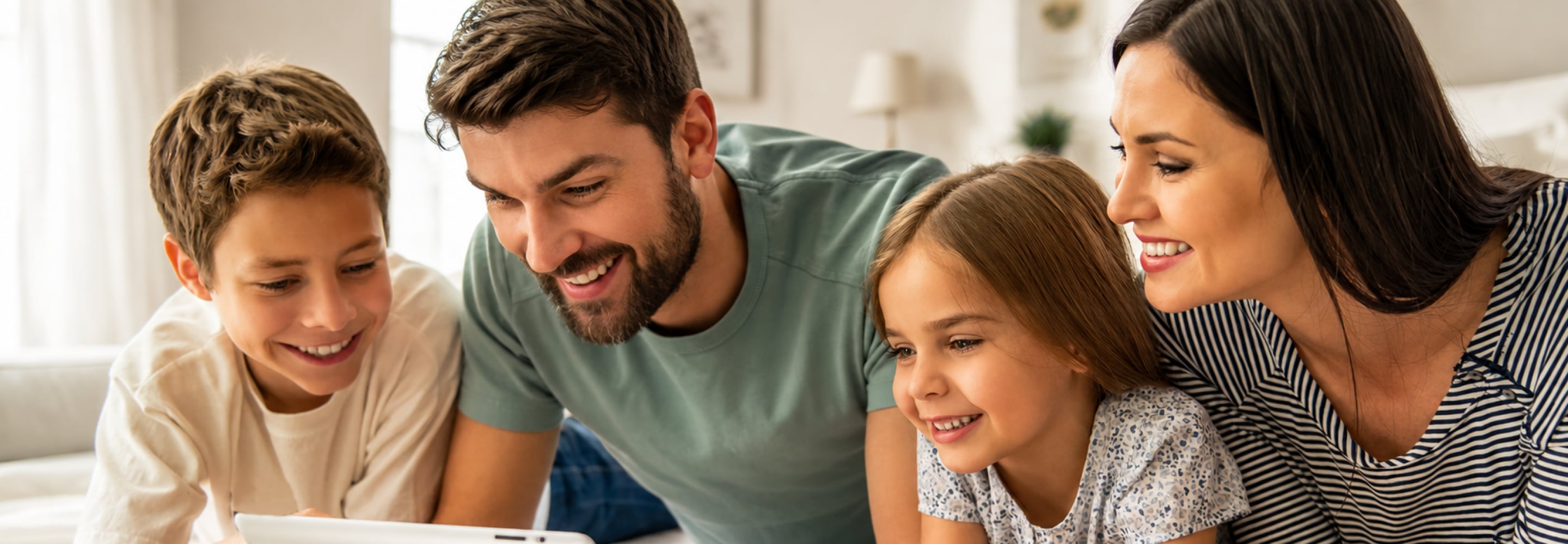 Smiling family gathered closely together at home
