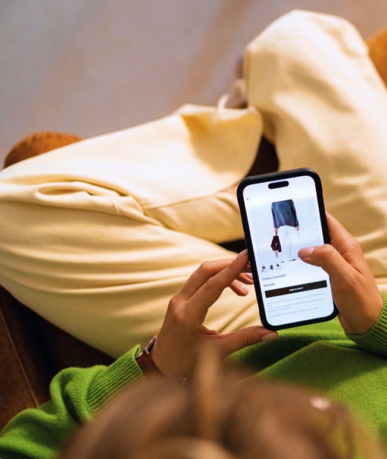 Shopper browsing a clothing product on a smartphone