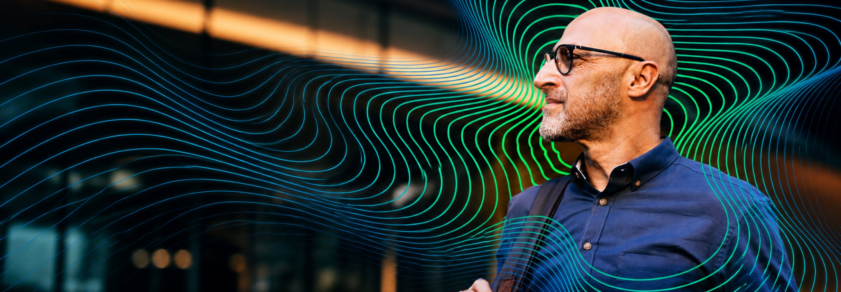 Businessman looking at flowing digital data lines